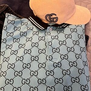 Preowned Gucci Blue Polo Shirt with GG Pattern size Large. Belong to my son!